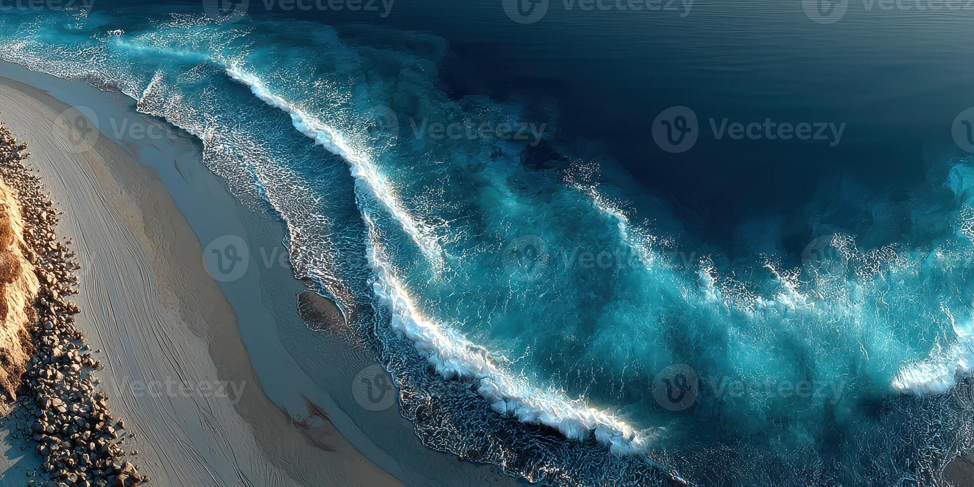 Waves crashing against the sandy shore at sunset along a peaceful coastline photo