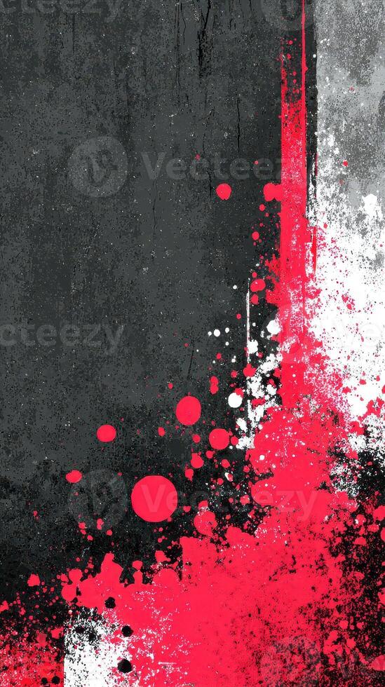 Colorful explosion of red and white paint splatters on a textured dark background photo