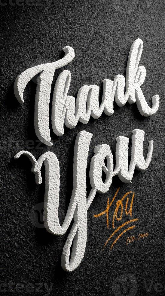 Thank you message in decorative white font on dark textured wall showcasing gratitude and appreciation photo