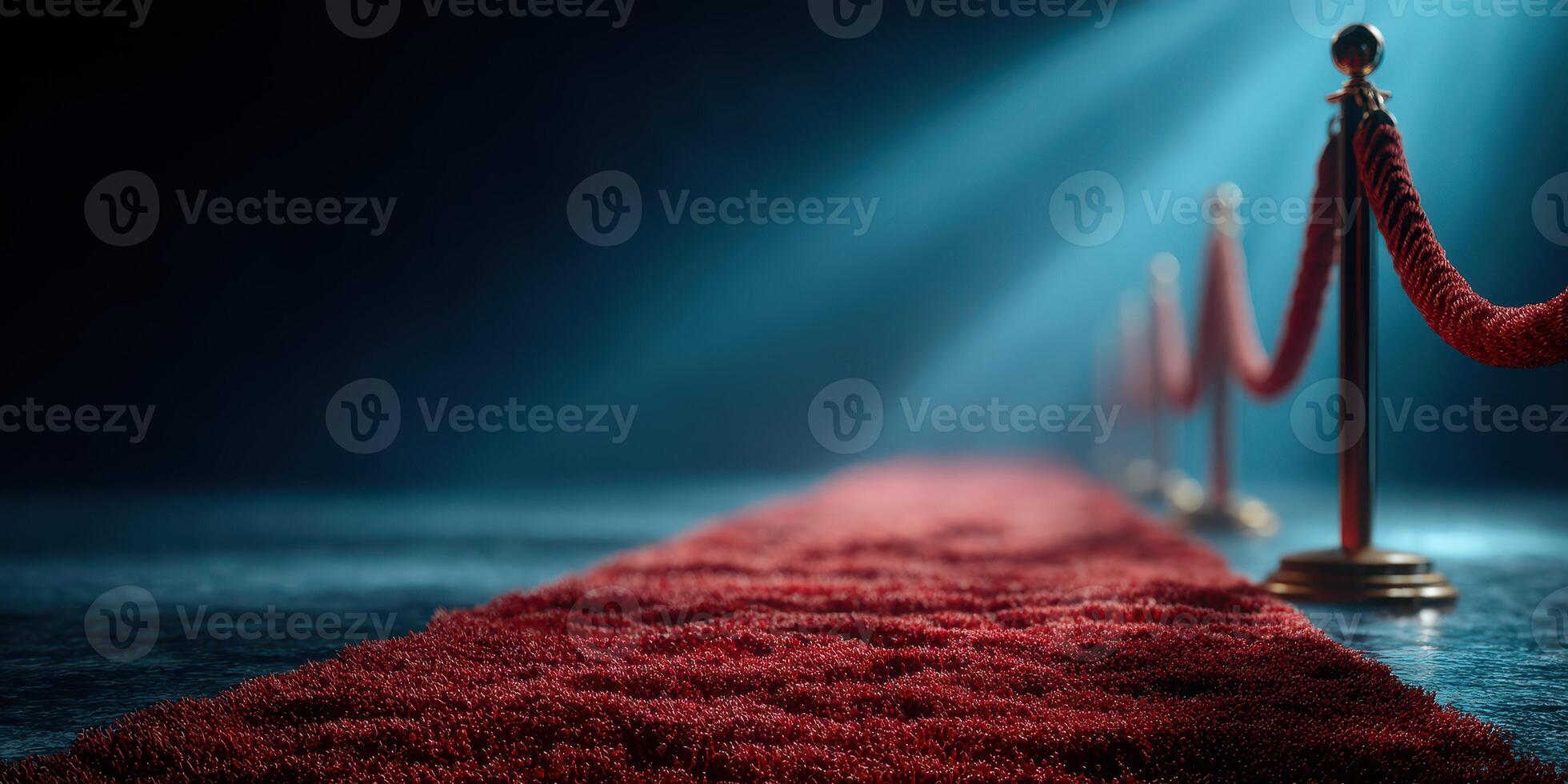 Elegant red carpet leading to a spotlight in a darkened venue during an upscale event in the evening photo