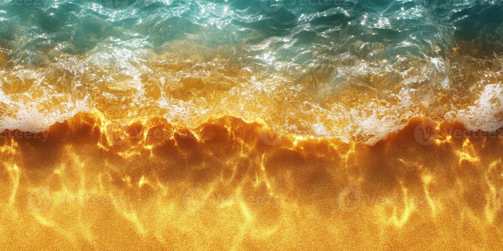 Waves gently lap at the golden sandy shore during a bright sunny day at the beach photo