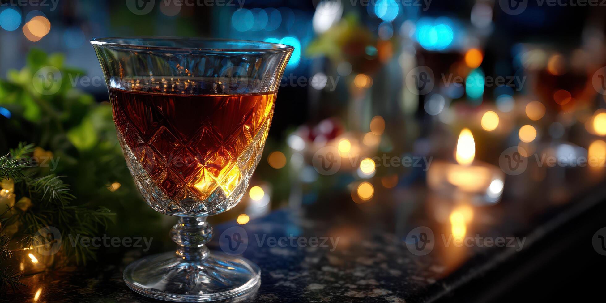 Elegant glass of dark drink with blurred lights and decorations in a cozy bar setting during the evening hours photo