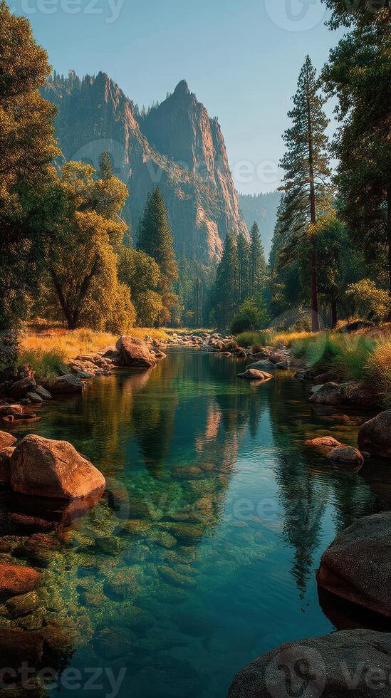 Majestic mountain landscape with a crystal-clear river flowing through a lush forest during sunset photo