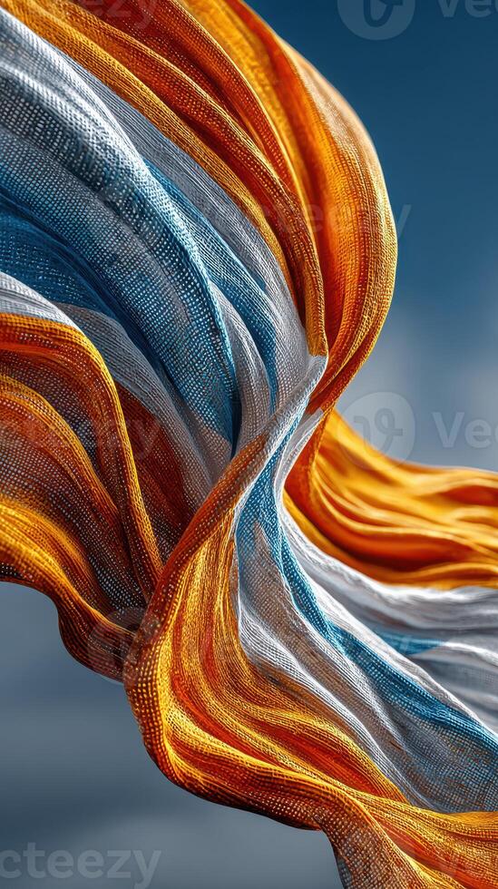 Colorful fabric waves dance under a clear sky during a sunny day in nature photo