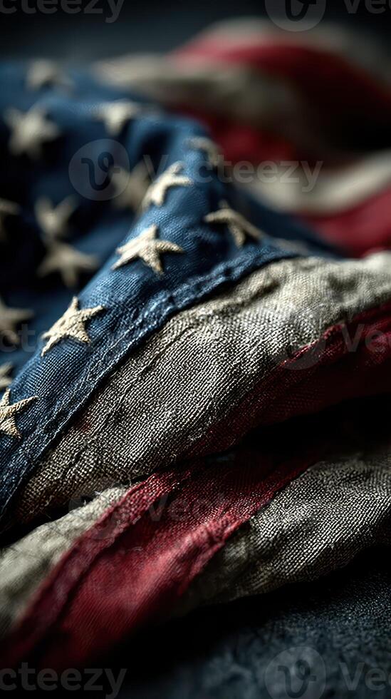 Close-up view of a vintage American flag showcasing rich colors and textures photo