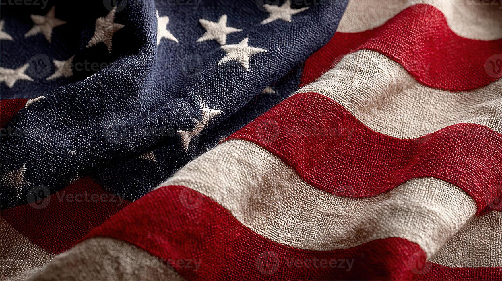 Woven textures and colors of a weathered American flag showcase rich history and patriotism in natural light photo