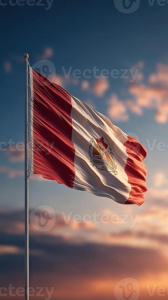 Canadian flag waving in the breeze against a vibrant sunset sky photo