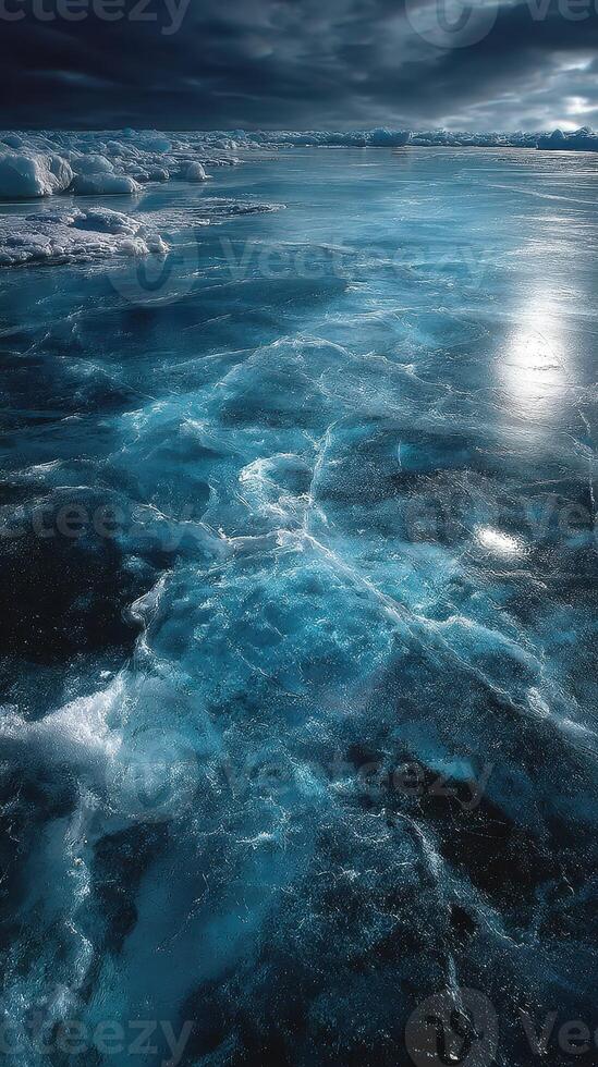 Frozen surface reflects the light under a cloudy sky on a chilly winter day photo