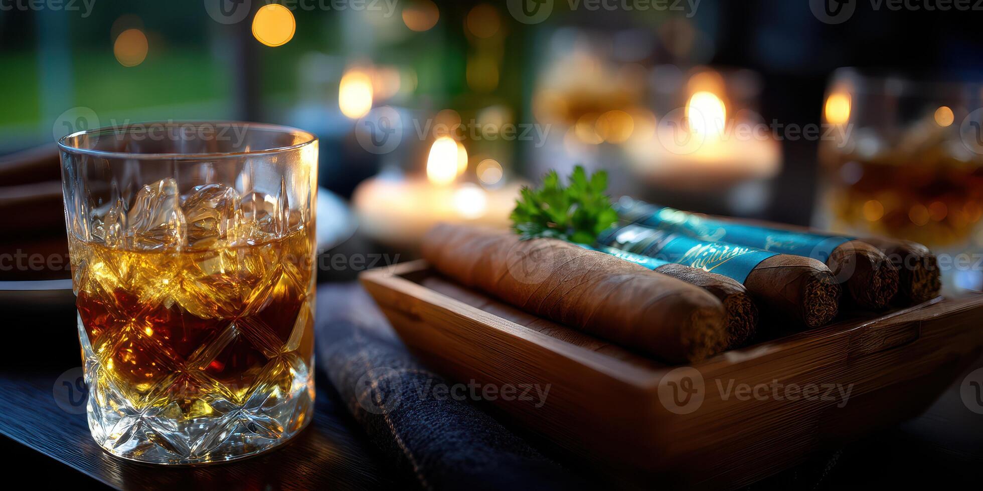 Relaxing evening with whiskey and cigars at a cozy outdoor setting photo