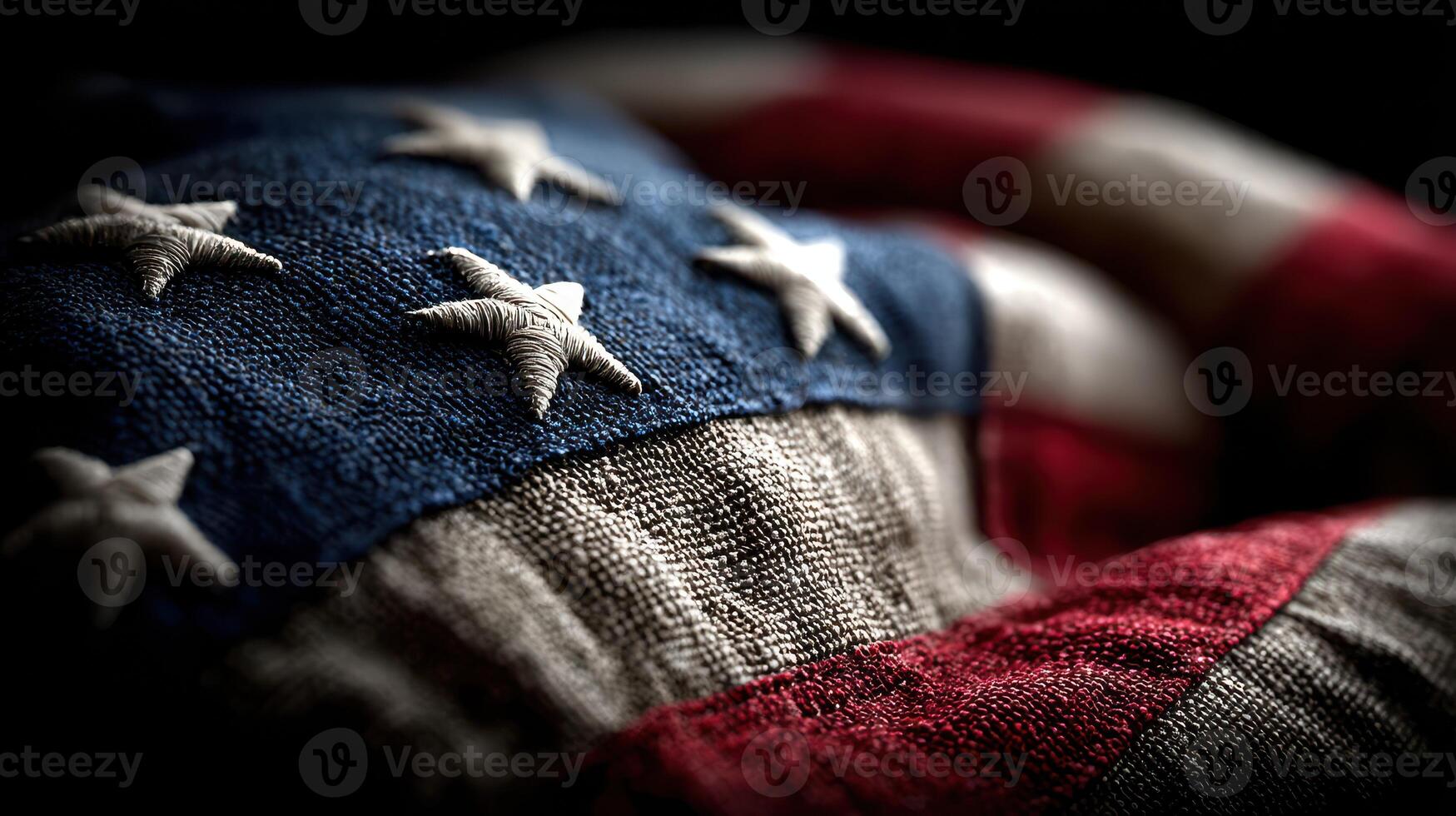 American flag draped with texture showcasing fabric details in low light setting during patriotic celebration photo