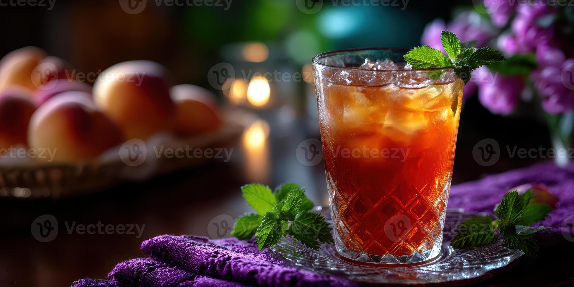 Refreshing iced tea with mint and peaches served at a cozy gathering in a dimly lit setting photo