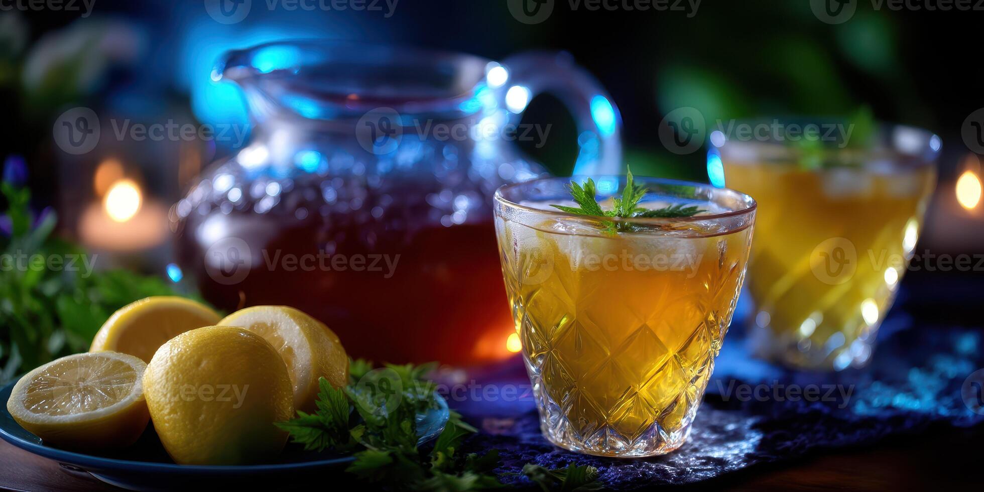 Refreshing summer drink served with lemon and herbs in a cozy setting photo