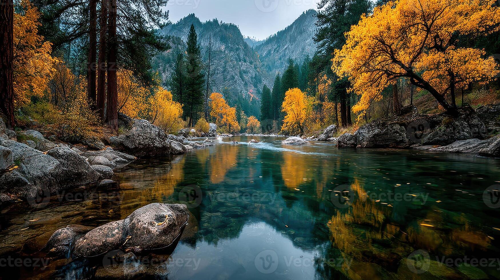 Autumn landscape with vibrant trees and calm river reflecting mountains photo