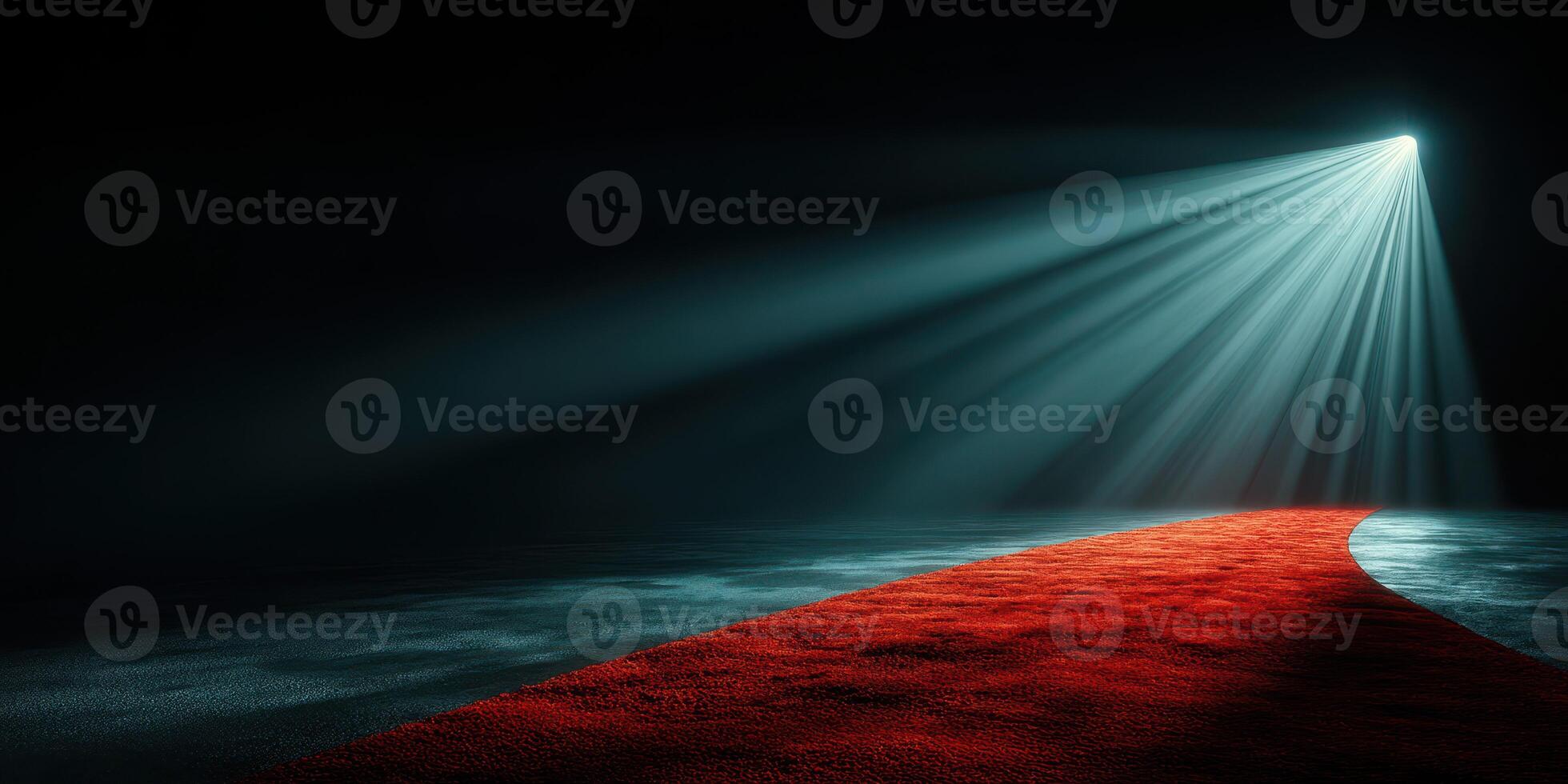 Spotlight shines on a red carpet in a darkened space preparing for a special event photo