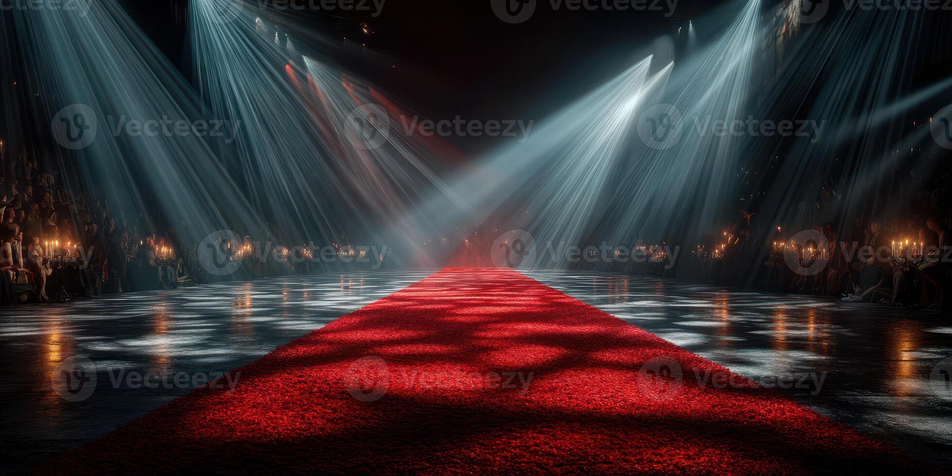 Red carpet runway illuminated by dramatic lighting at a fashion event in an upscale venue during nightfall photo