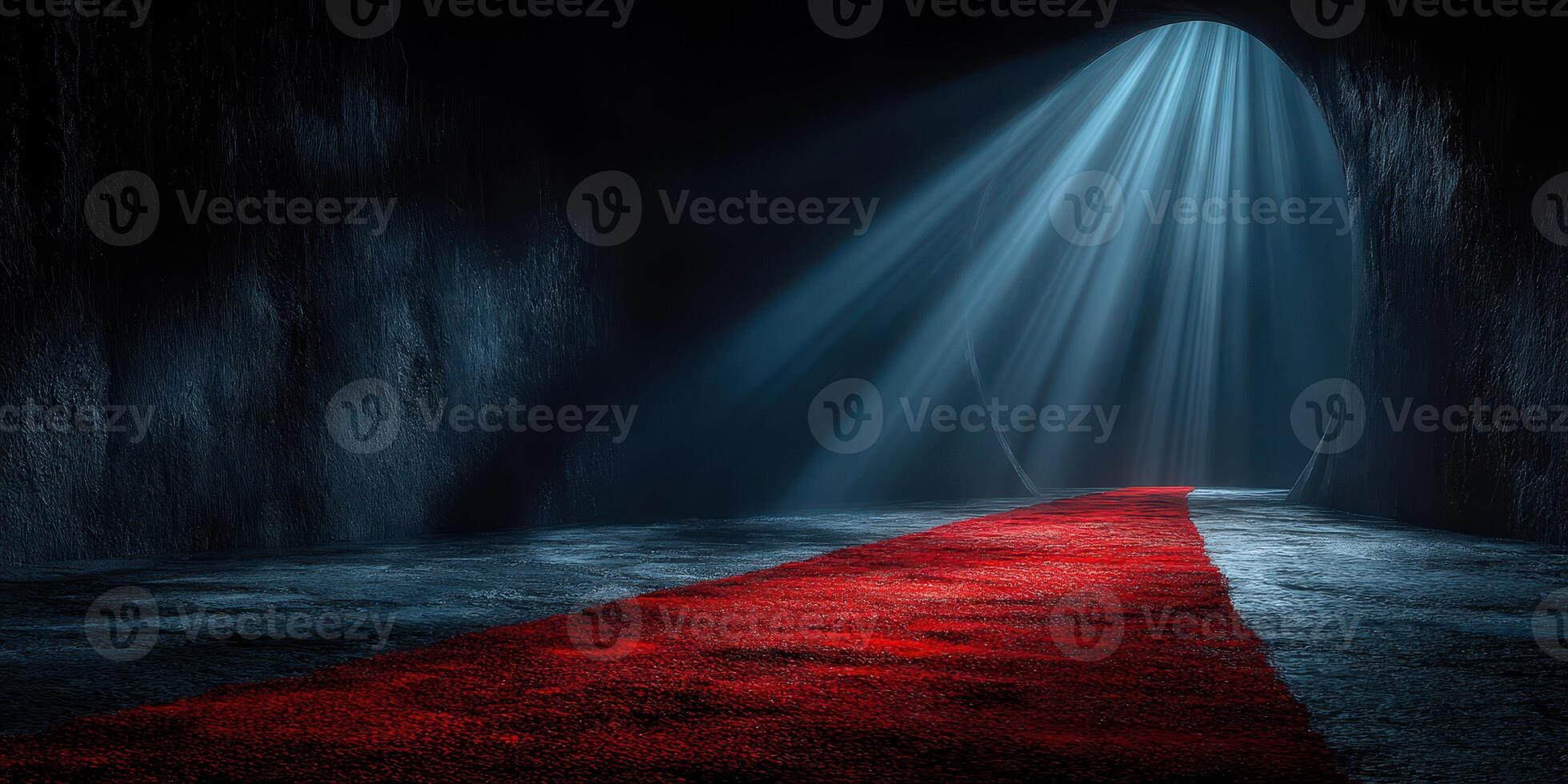 Bright beams of light shine through an archway onto a red carpet in a dimly lit cavern photo
