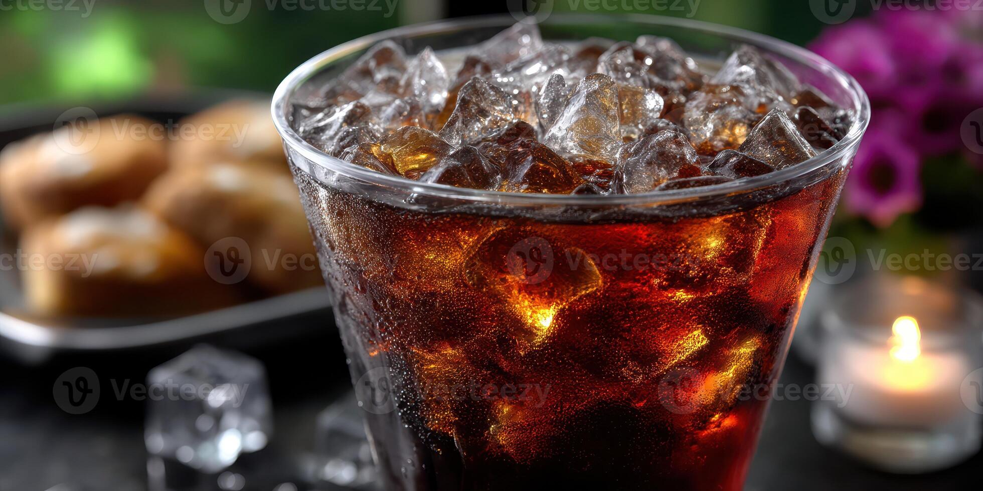 Refreshing iced beverage served with pastries in a cozy setting during late afternoon photo