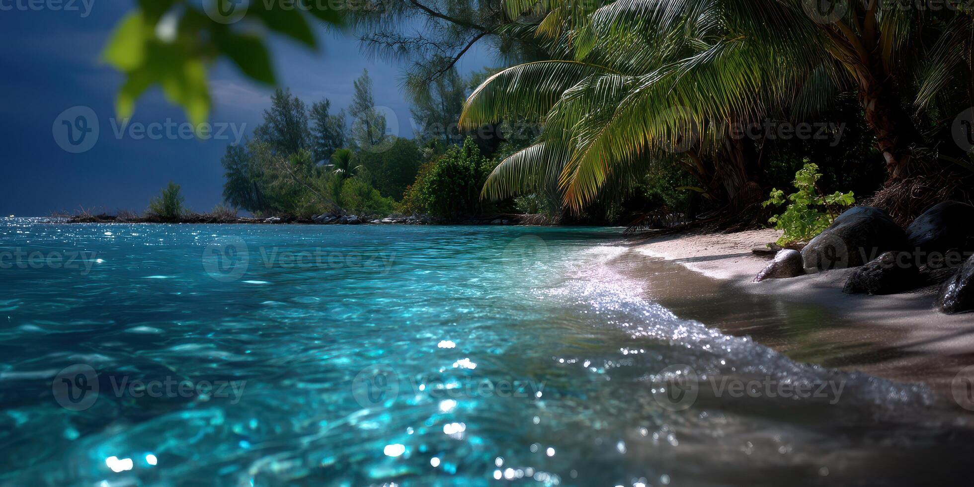 Serene tropical beach with crystal clear water and lush greenery at dusk photo