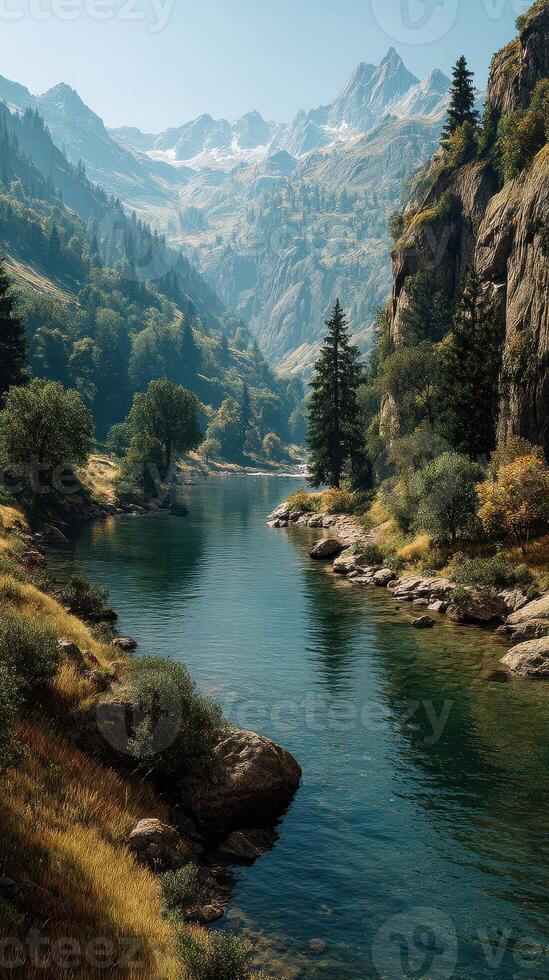 Serene river flowing through a lush valley with mountains in the background during clear daylight photo