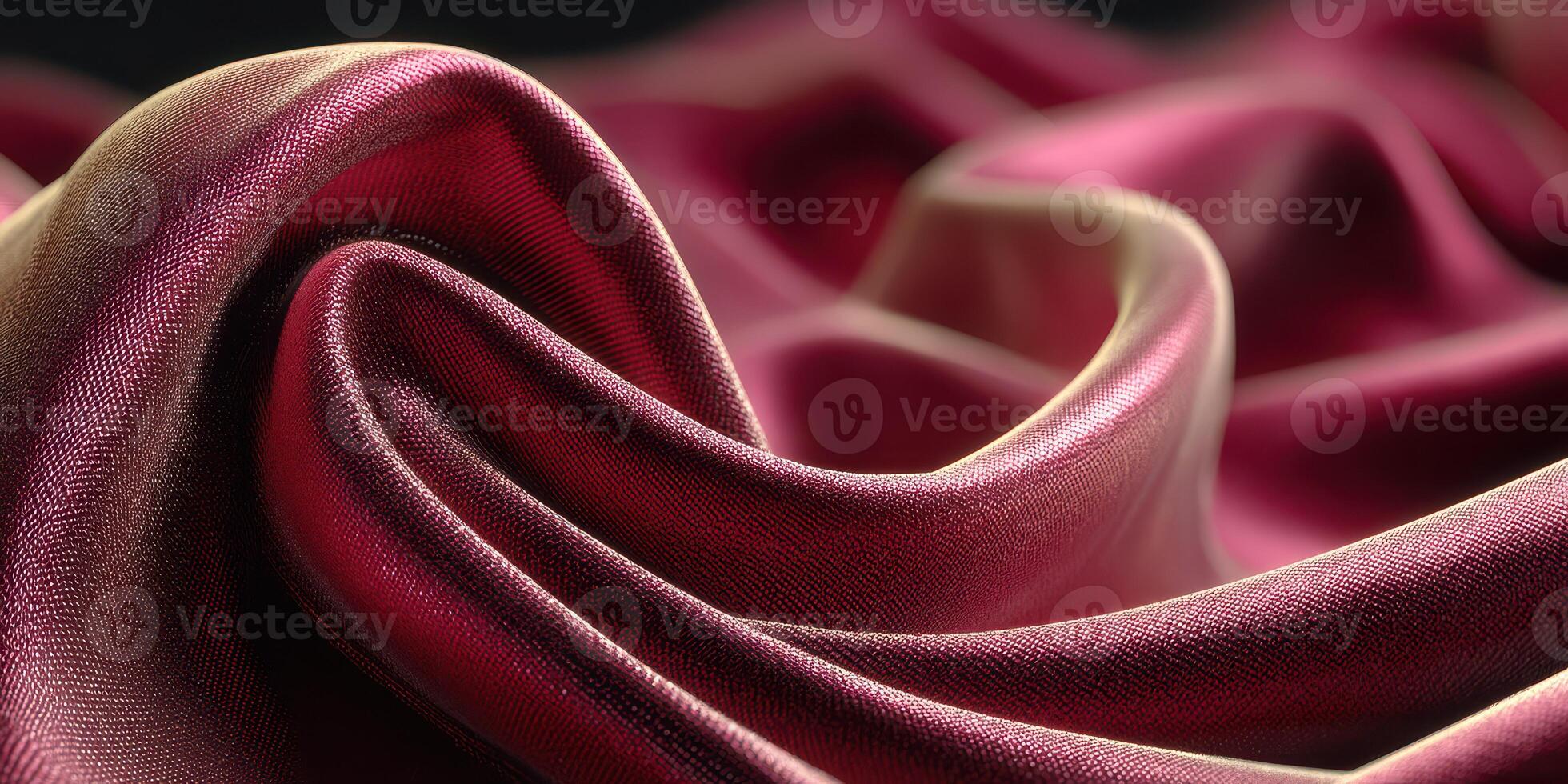 Rich red silk fabric draped gracefully, showcasing its texture and depth in soft lighting photo