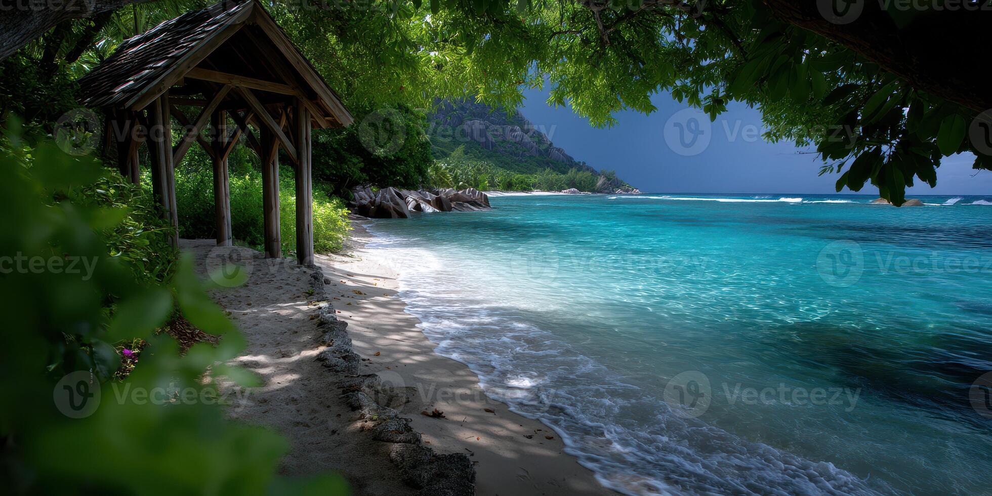 Secluded beach with tropical water and gentle waves under a partially cloudy sky near lush greenery photo