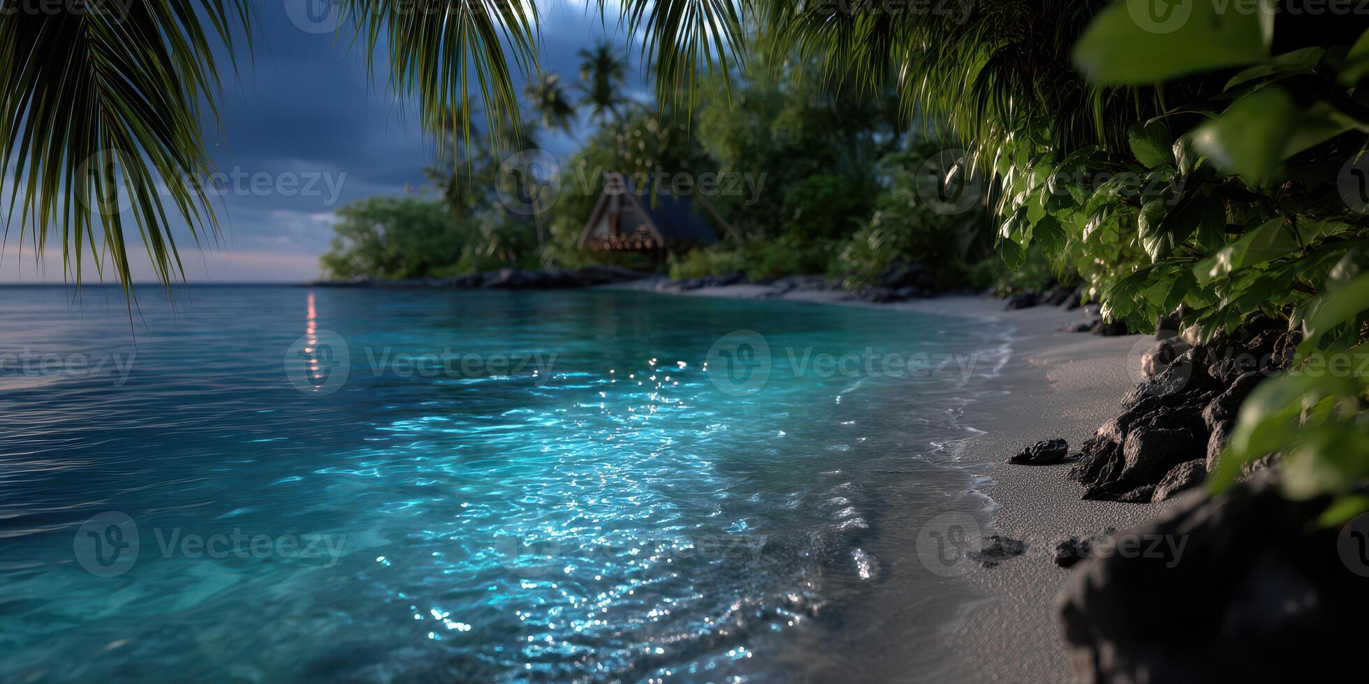 Tropical beach with clear water and lush greenery at sunset near a secluded hut photo