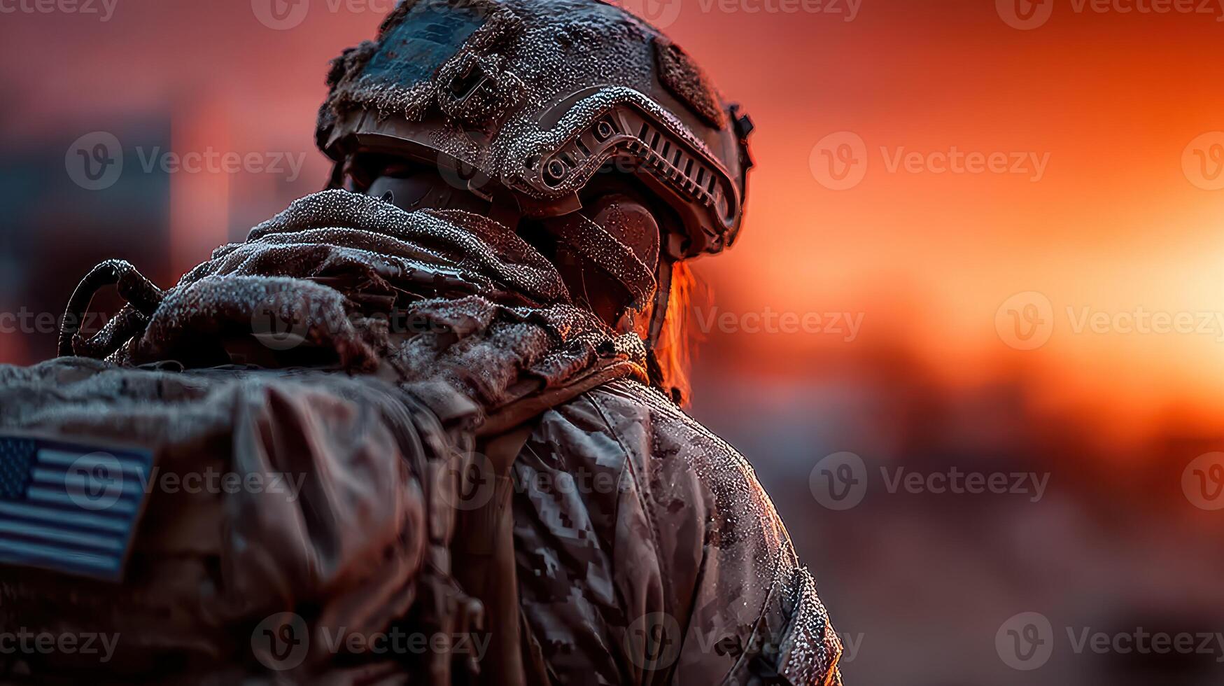 Soldier stands against a vibrant sunset, embodying resilience in a harsh, frozen environment during winter operations photo