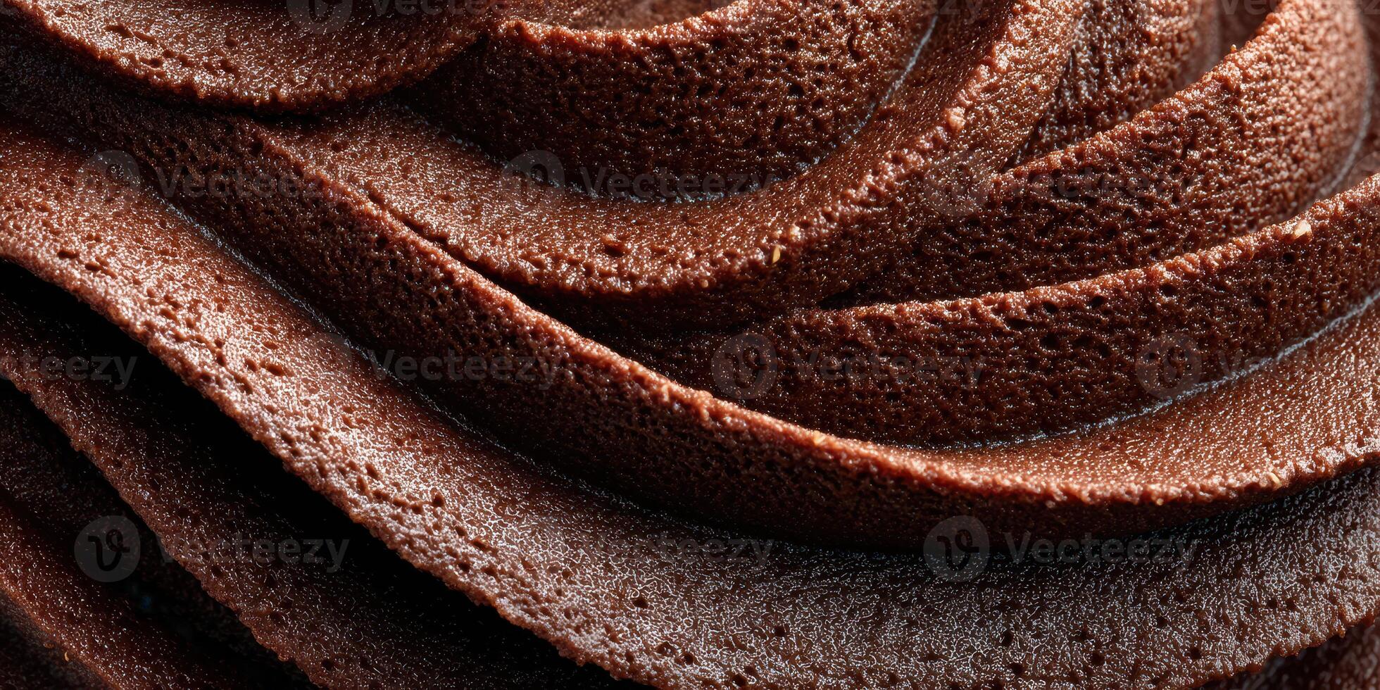Rich and creamy chocolate mousse with smooth texture, ideal for desserts and culinary creations photo