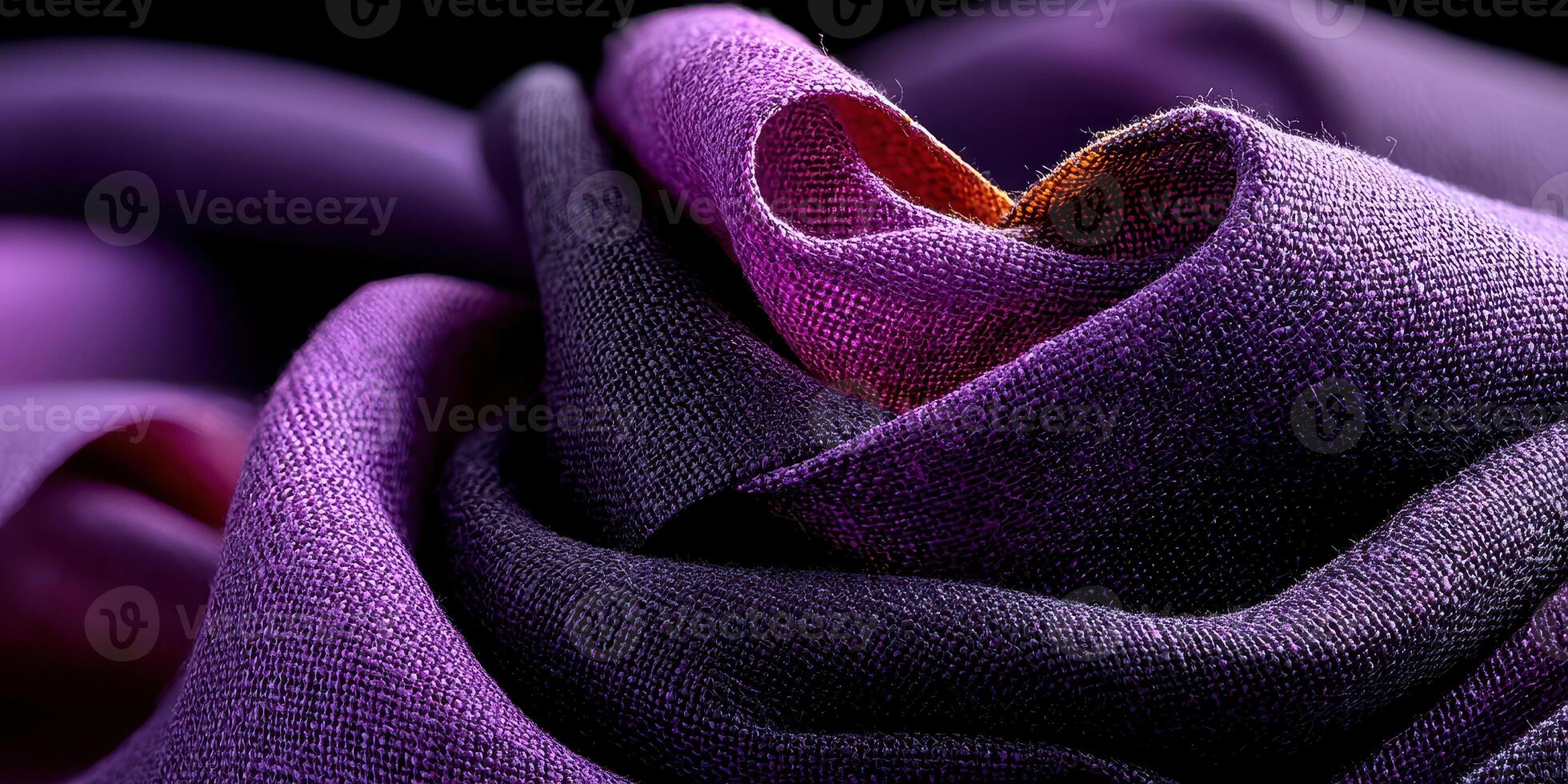 Colorful textile fabric elegantly arranged with intricate folds and rich textures for artistic display photo