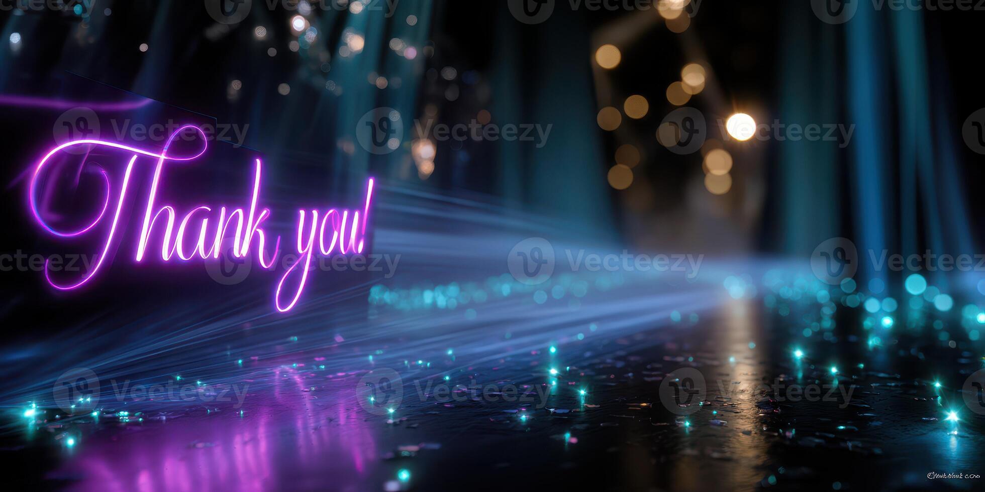 Thank you message illuminated with vibrant colors and sparkling lights in a dark setting photo