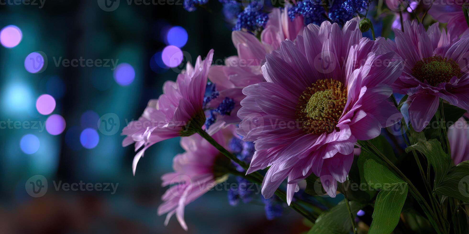 Vibrant flowers in soft focus against a dreamy bokeh background at dusk photo