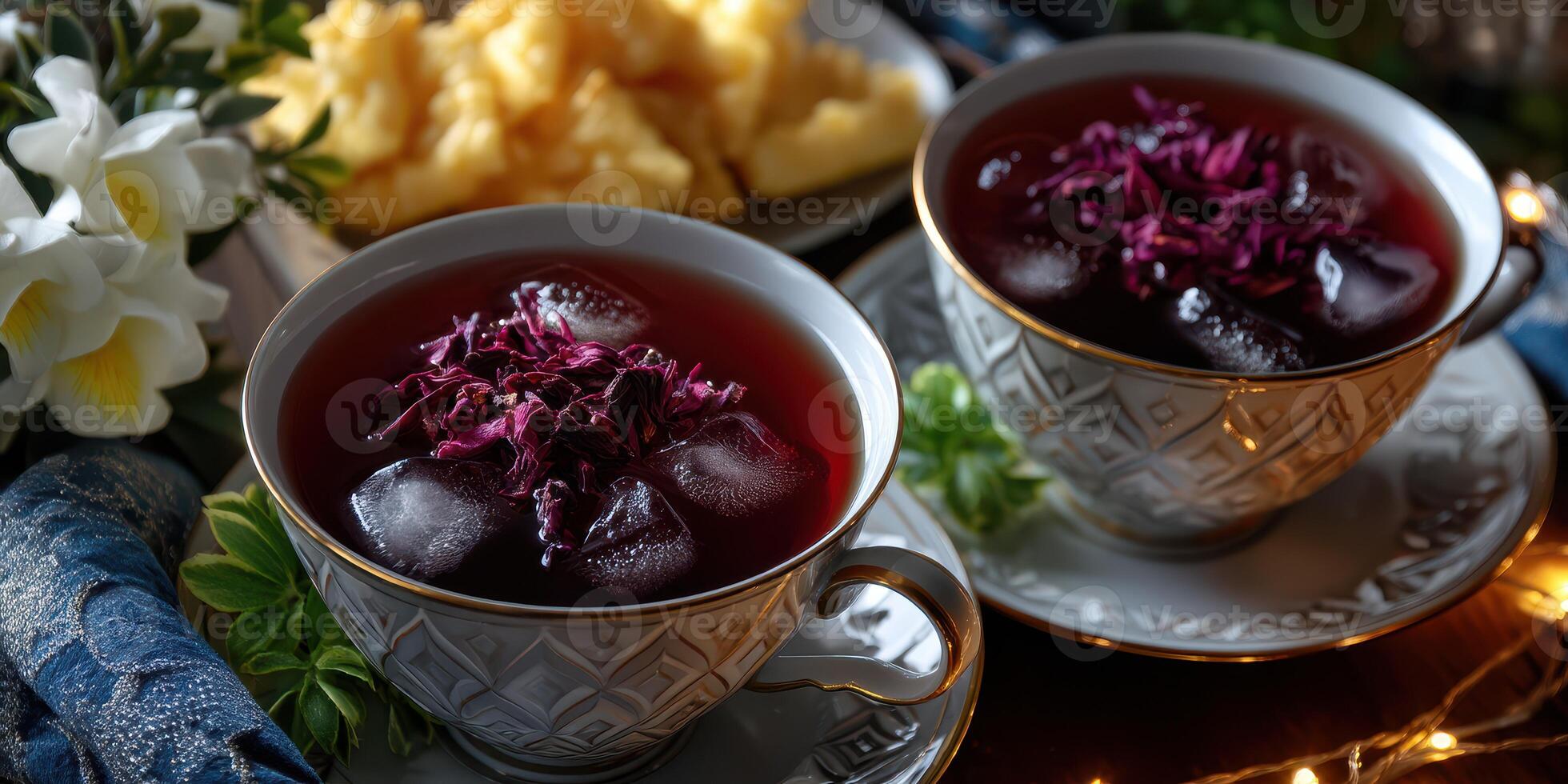 Refreshing hibiscus tea served with snacks in a cozy setting during an afternoon gathering photo