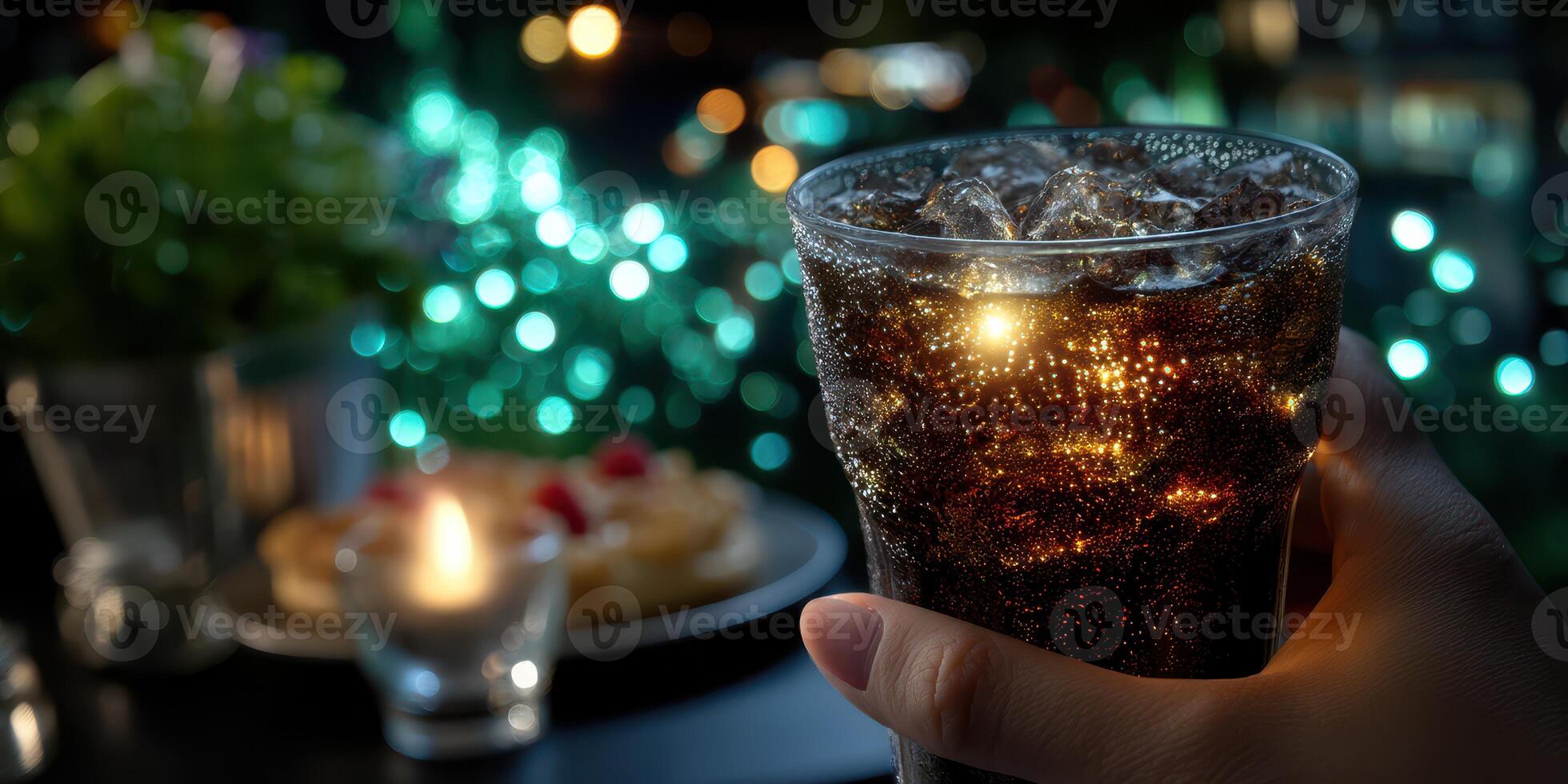 Refreshing drink enhances evening gathering at outdoor dining spot with beautiful bokeh lighting photo