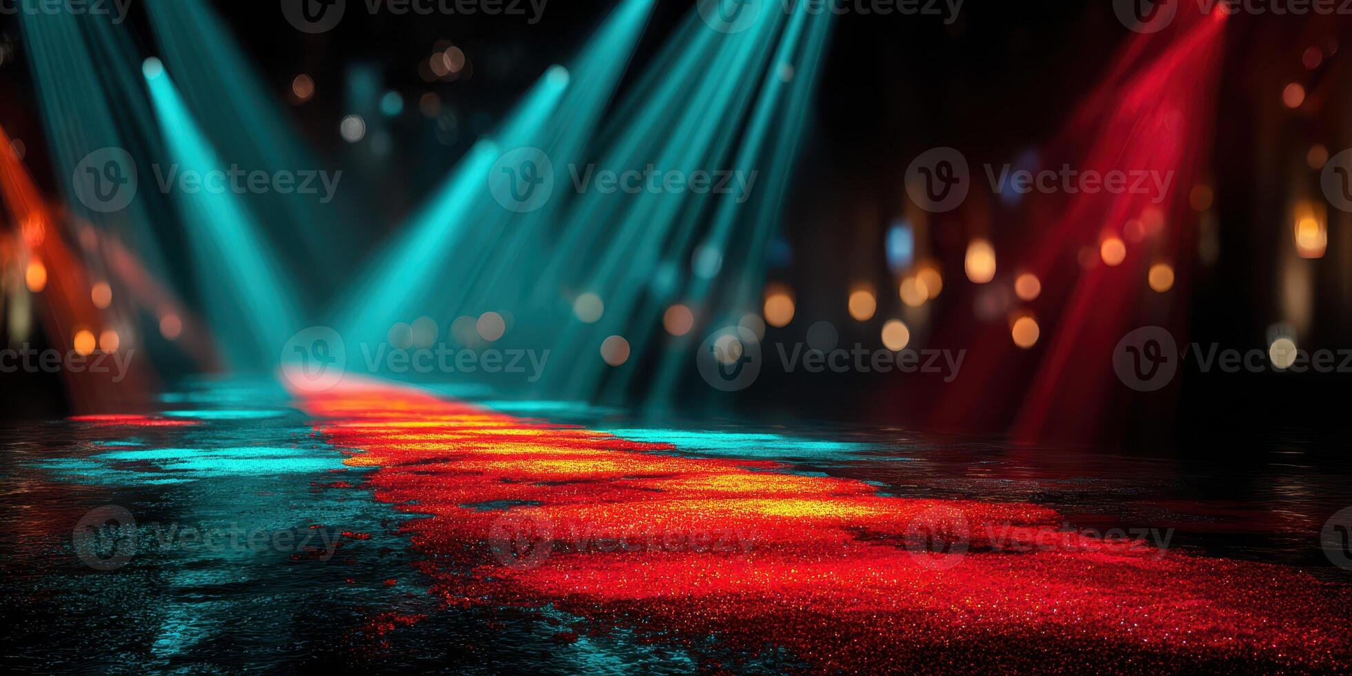 Colorful light beams illuminate a reflective surface in a vibrant performance space during an evening event photo
