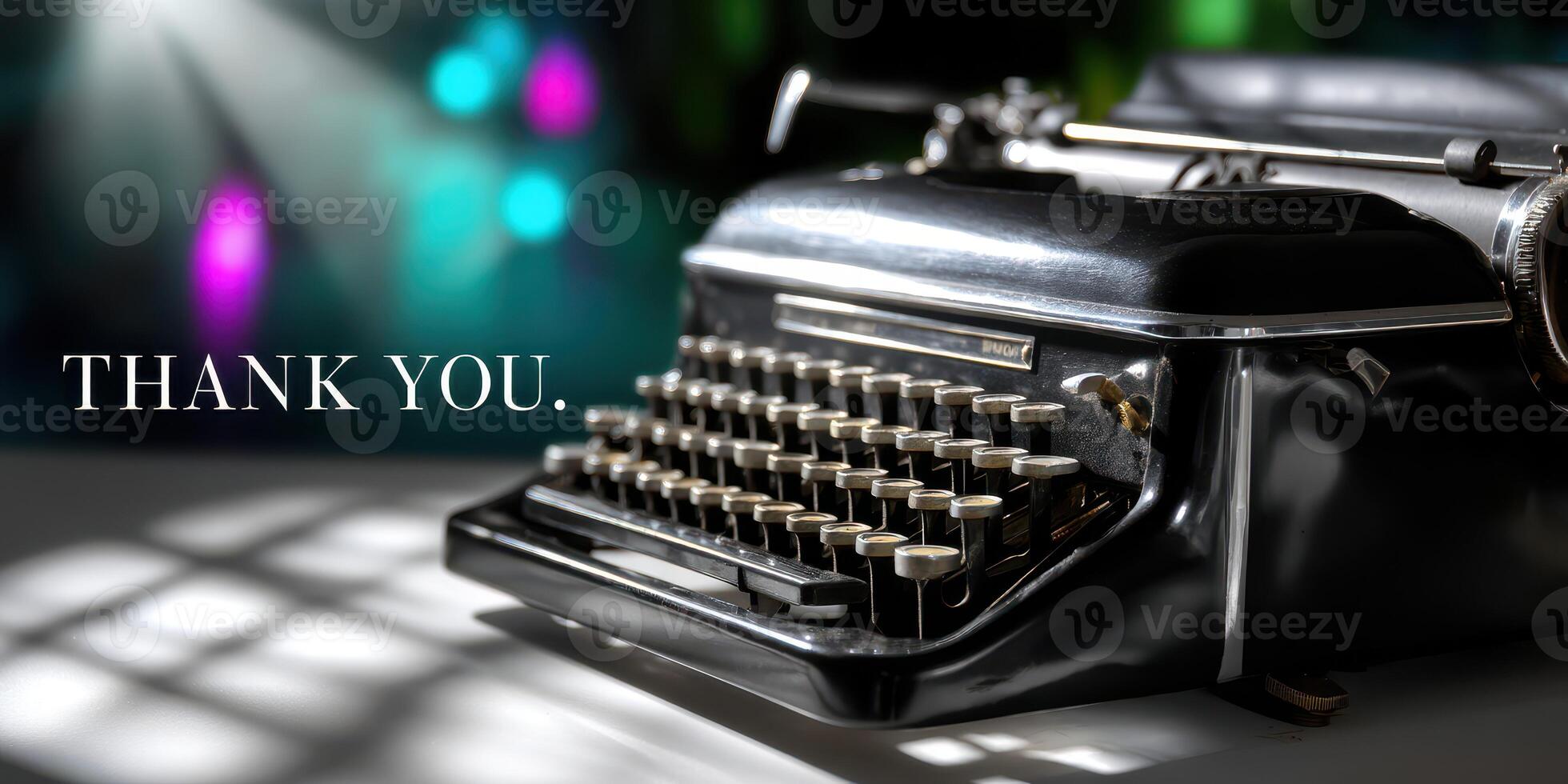 Vintage typewriter with a thank you message on display in a dimly lit room during an evening event photo