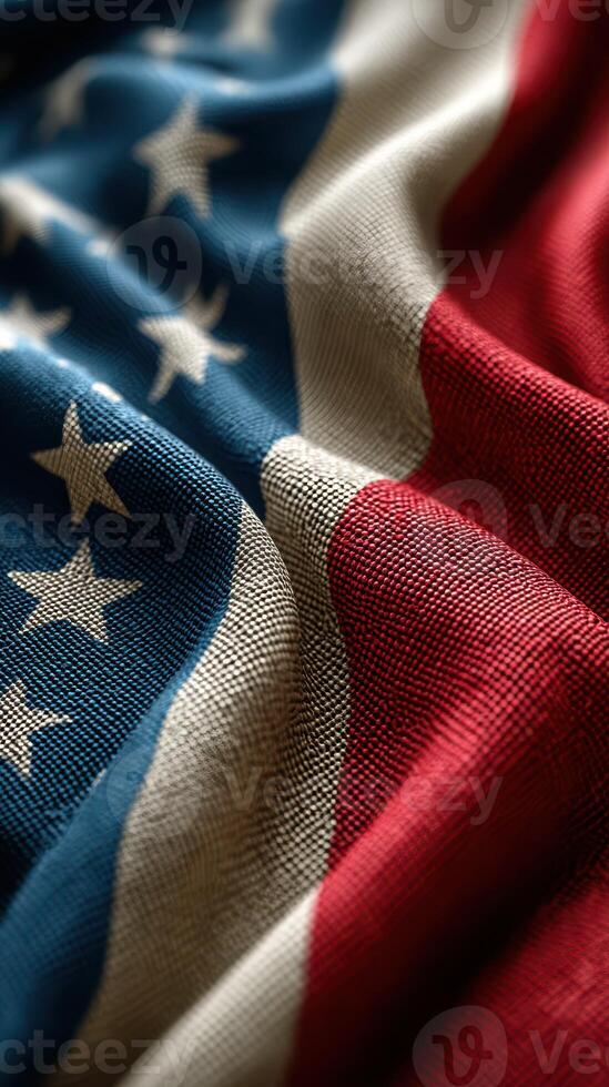 Close-up view of a United States flag draped on a surface, showcasing fabric texture and colors during a patriotic celebration photo