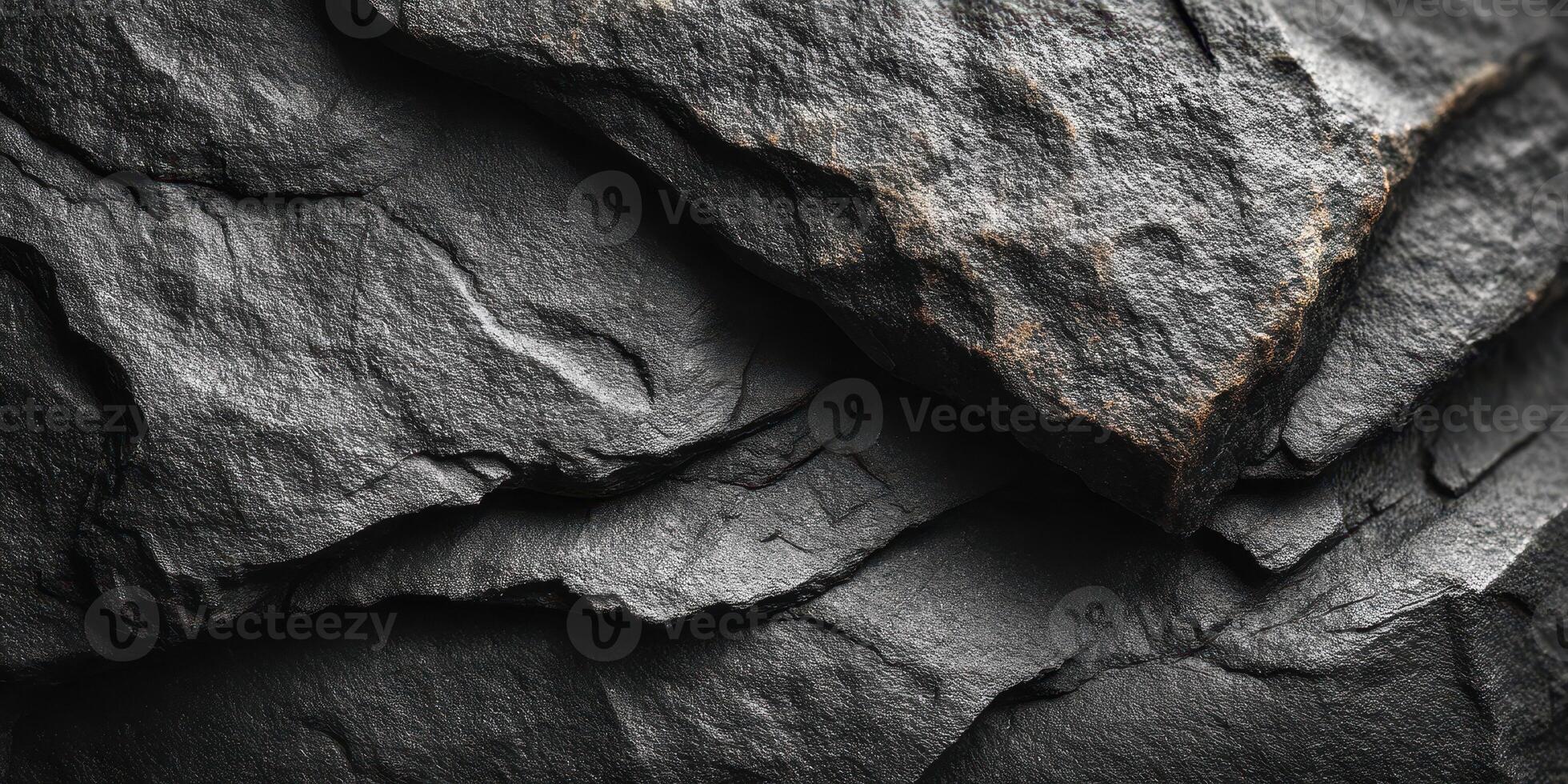 Natural slate rock formation showing layers and textures in close-up with soft lighting photo
