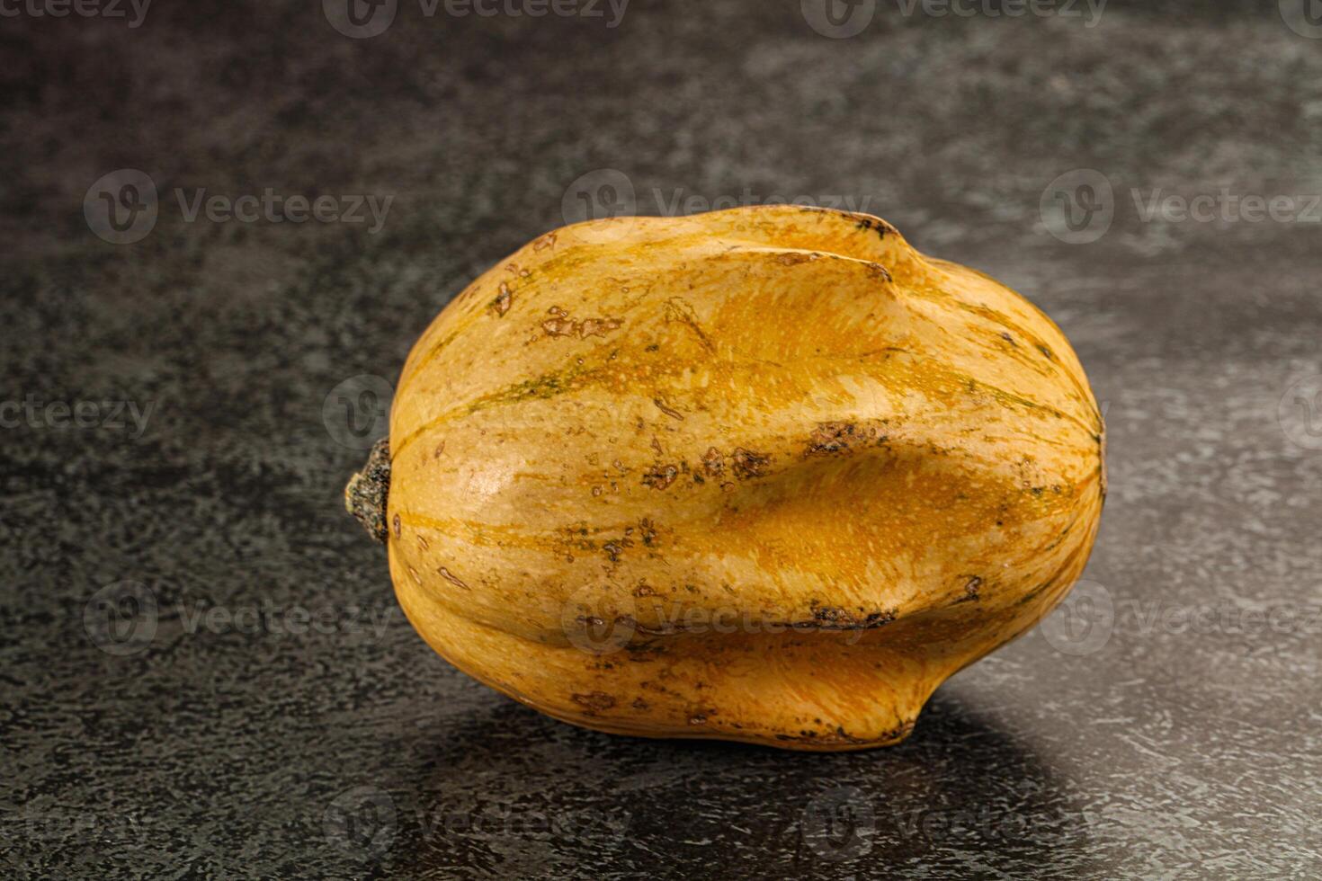 A squash on a table photo