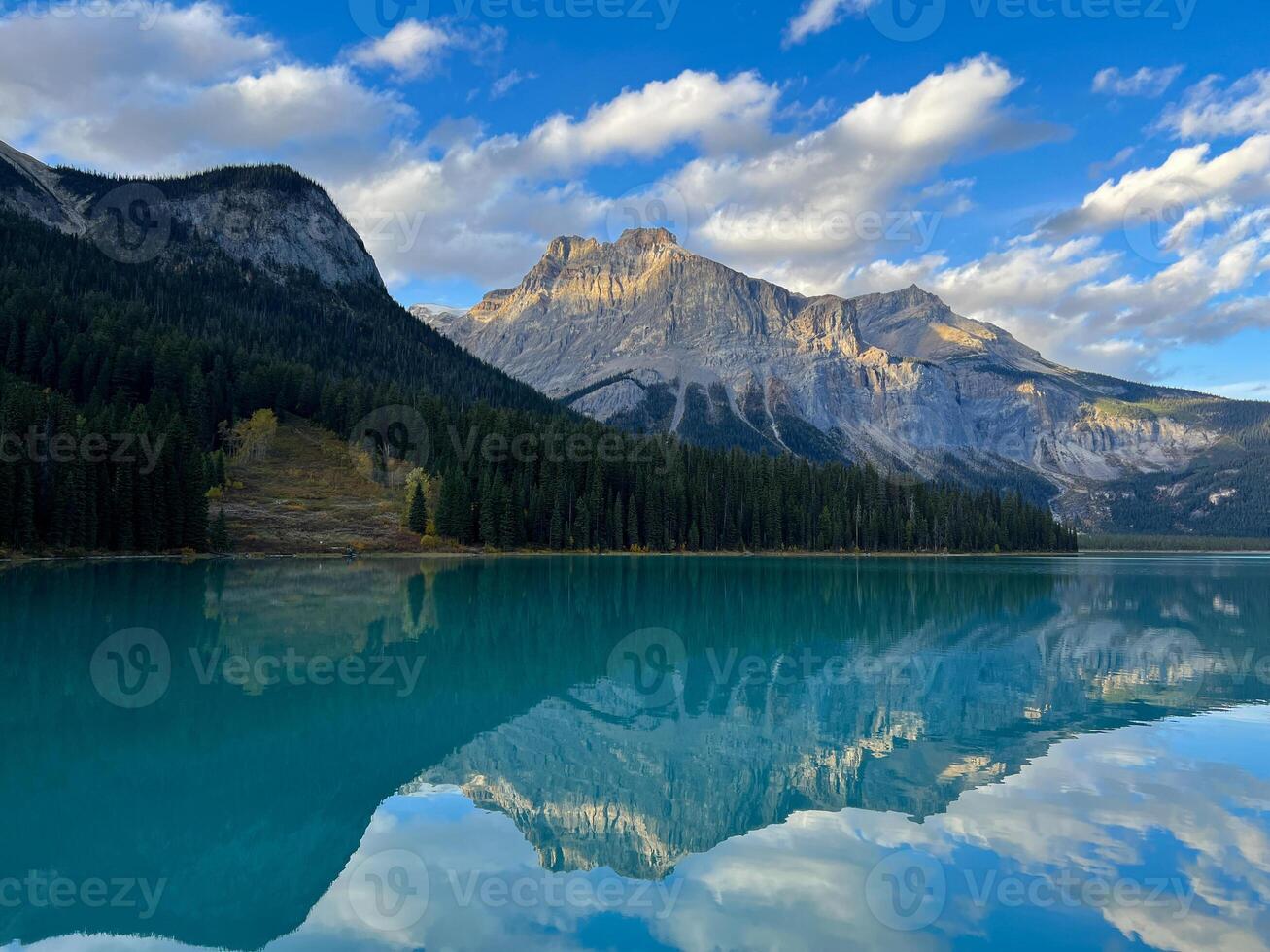 Emerald Lake with Reflection of Mountians in Water at Sumy Day, Yoho National Park, British Columbia, Canada photo