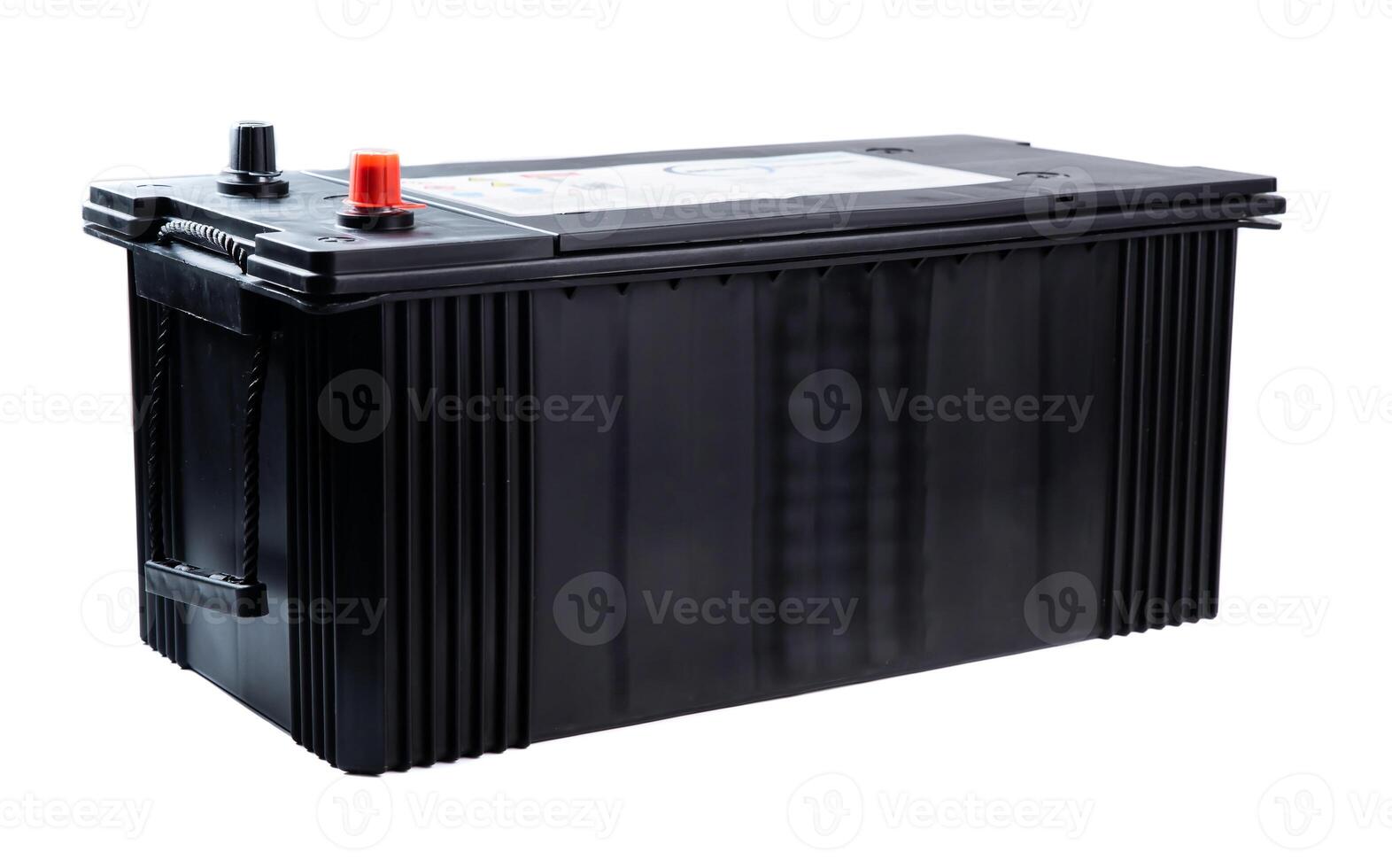 Single wide black truck battery with side handles for easy lifting. Heavy-duty power unit isolated on white background. Perfect for catalog or store. photo