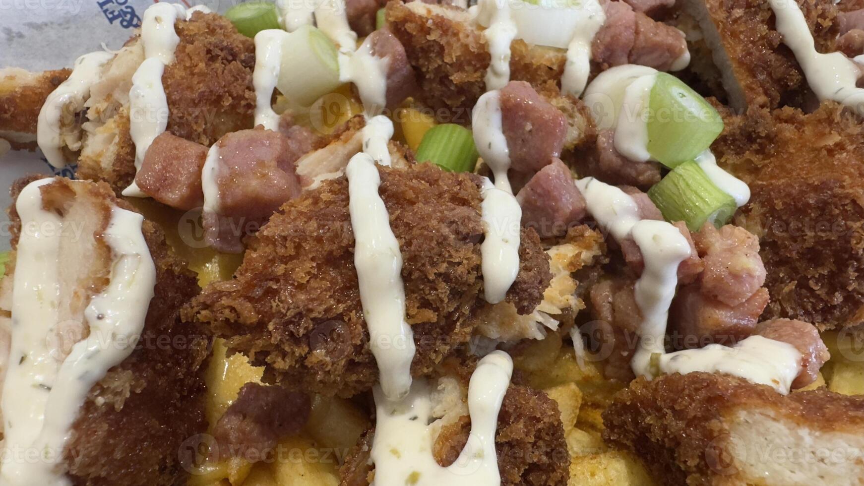 Loaded Fries with Fried Chicken, Sausage, and Green Onions photo