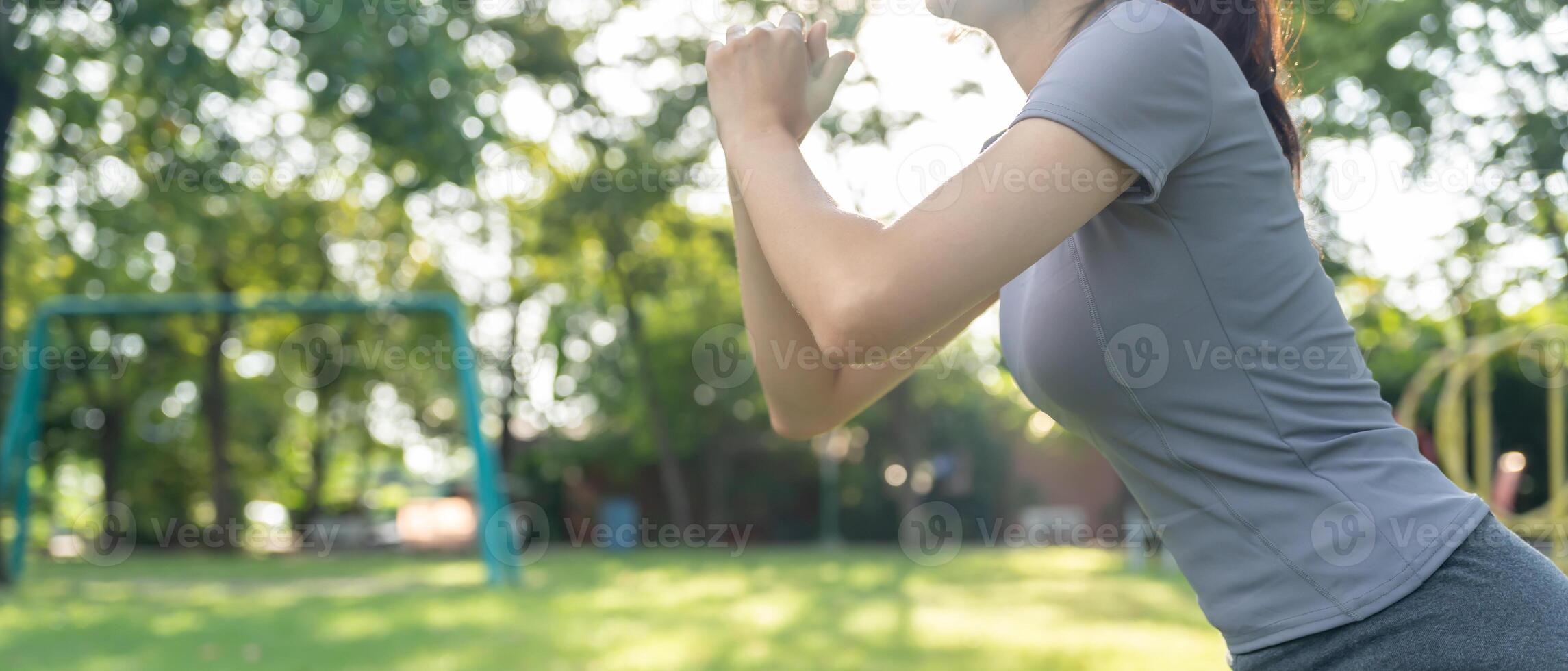 female exert on the park. Asian woman doing exercises in morning. balance, recreation, relaxation, calm, good health, happy, relax, healthy lifestyle, reduce stress, peaceful, Attitude. photo