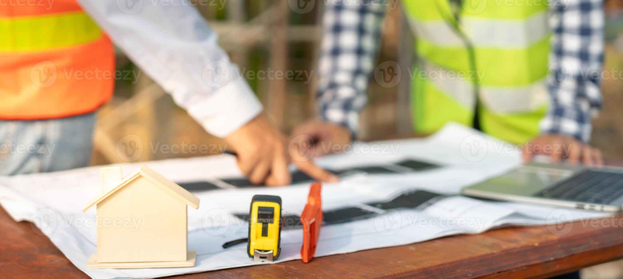 project is inspecting construction and quality assurance new house. Engineers or architects or contactor work to build the house before handing it over to the homeowner photo