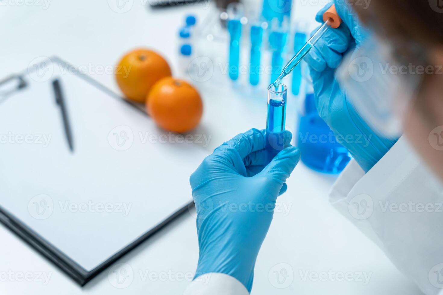 Scientist check fruit in laboratory. Control experts inspect the concentration of chemical residues. hazards, standard, find prohibited substances, contaminate, Microbiologist photo