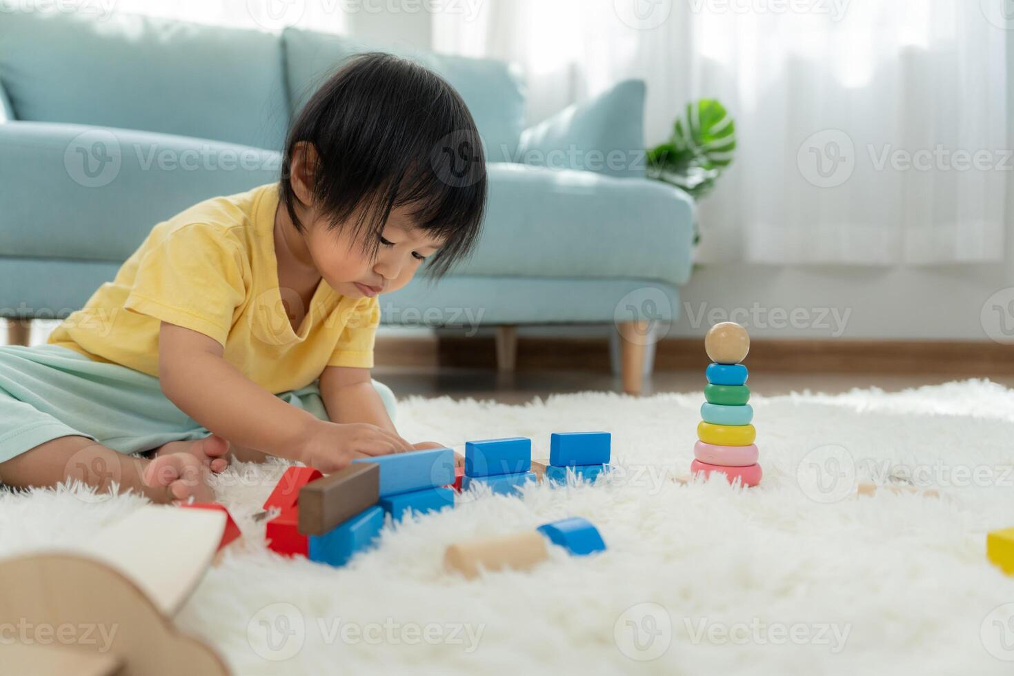 toy blocks. family is happy and excited in the house. daughter having fun spending time, Activity, development, IQ, EQ, meditation, brain, muscles, essential skills. photo