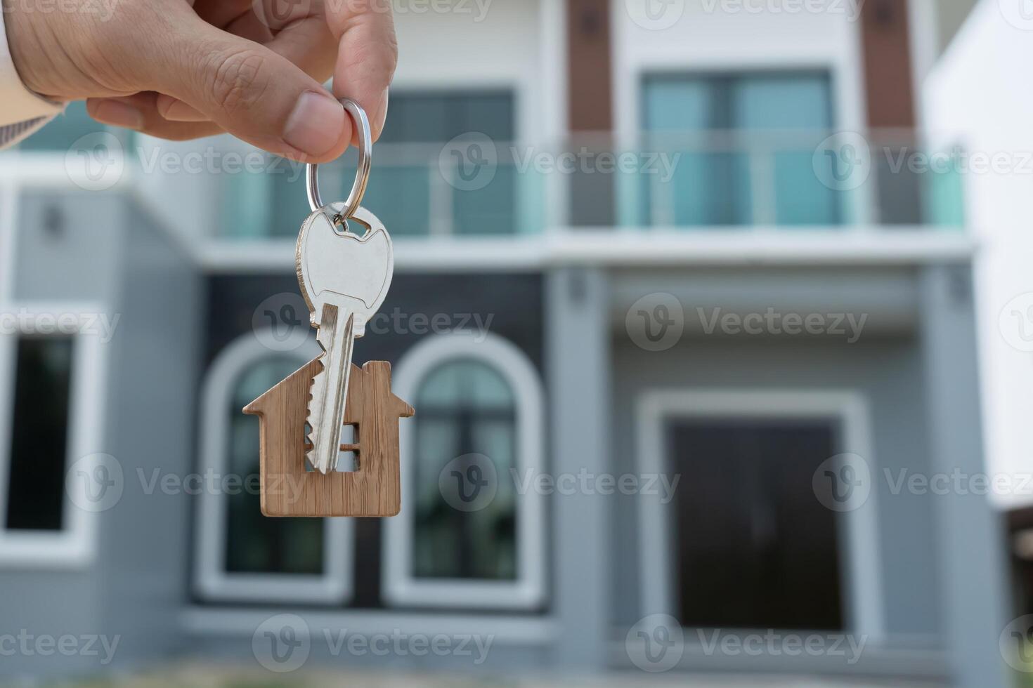 Real estate agent hold key for new house or real estate. rent house, Sales, loan credit financial, insurance, Seller, dealer, installment, buy, sell, photo