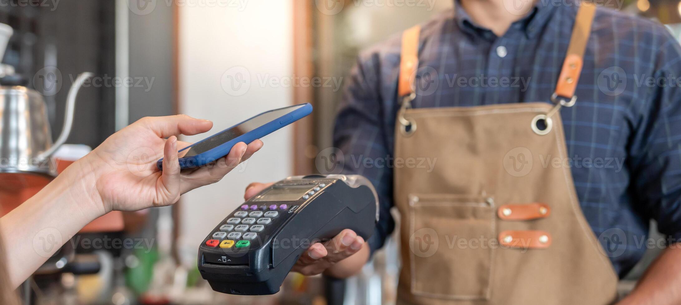 Happy Owner receive scan QR code to pay in cafe restaurant with a digital payment without cash. Choose menu and order accumulate discount. E wallet, technology, pay online, credit card, bank app. photo