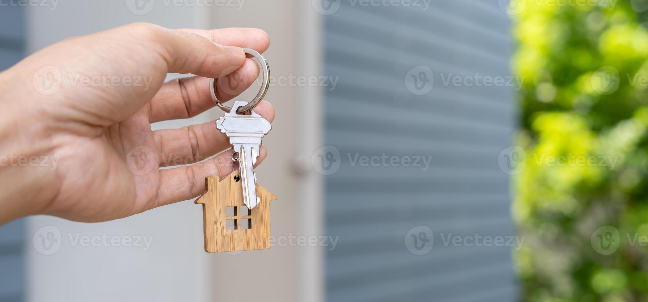 lease, rental and sell home. Real estate agent hold key for new house or real estate. rent house, Sales, loan credit financial, insurance, Seller, dealer, installment, buy, sell, move in photo