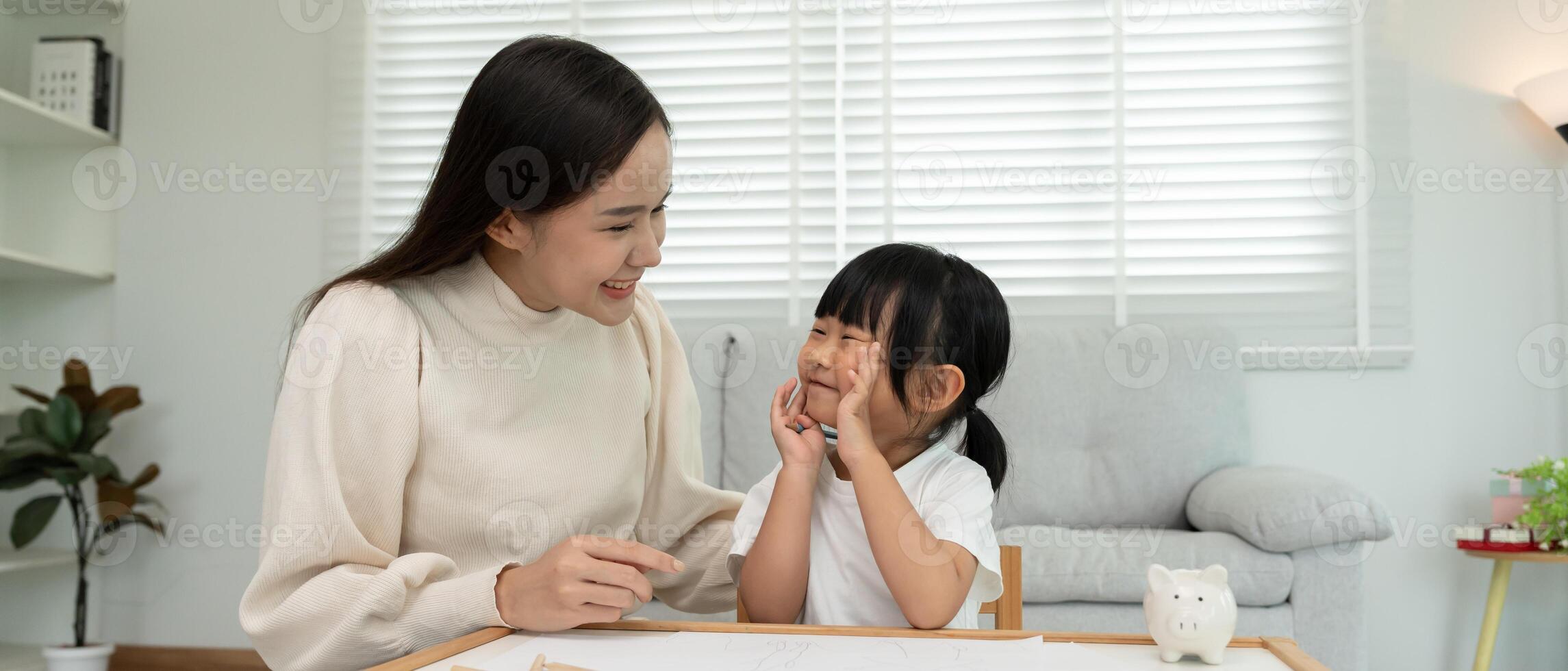 Mother day, Happy mother playing with the little girl. Funny family is happy and excited in the house. mother and daughter have fun spending time together. holiday, weekend, IQ, EQ, meditation photo