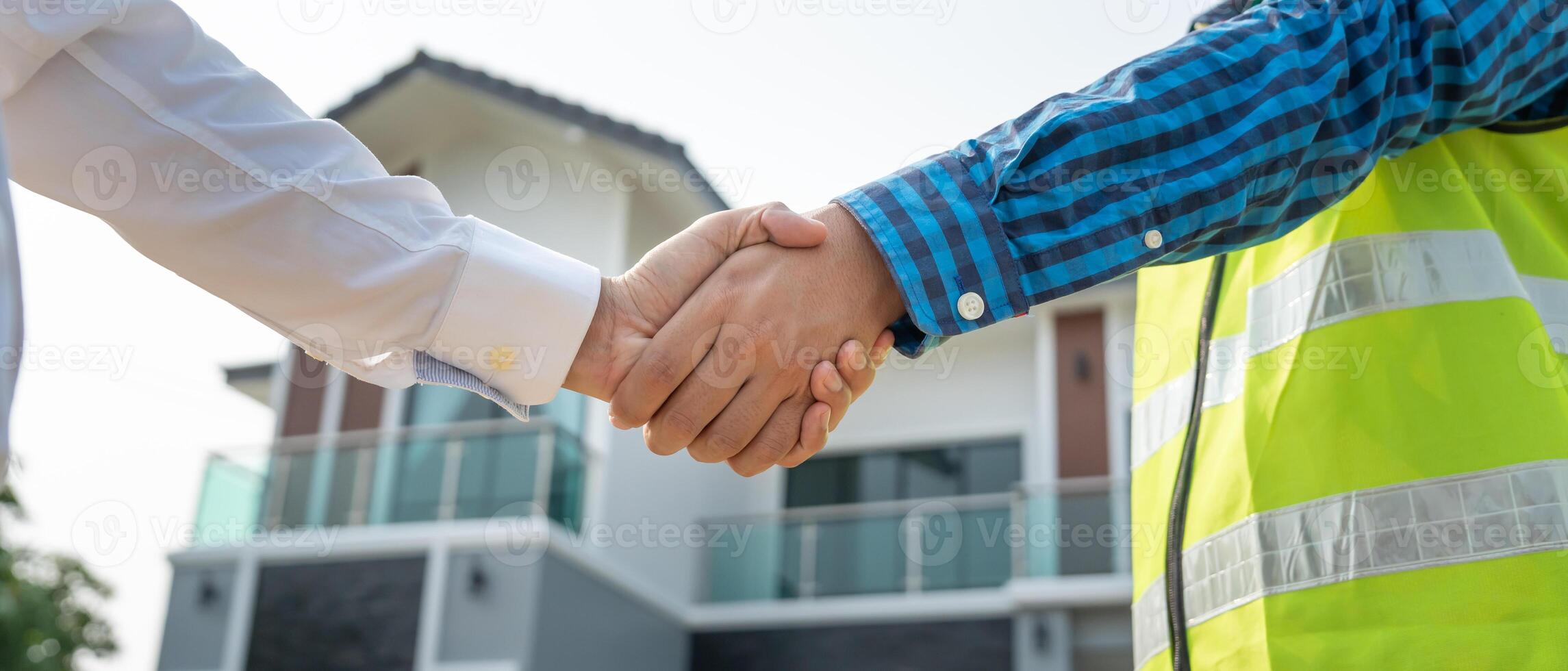 Construction team hand shaking greeting start up plan new project contract in office center at construction site, industry ,architecture, partner, teamwork, agreement, property, contacts. photo